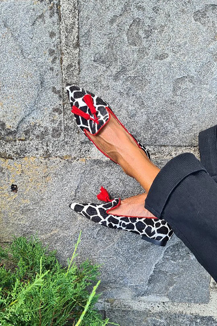 Animalprint mocassin met rode kwastjes