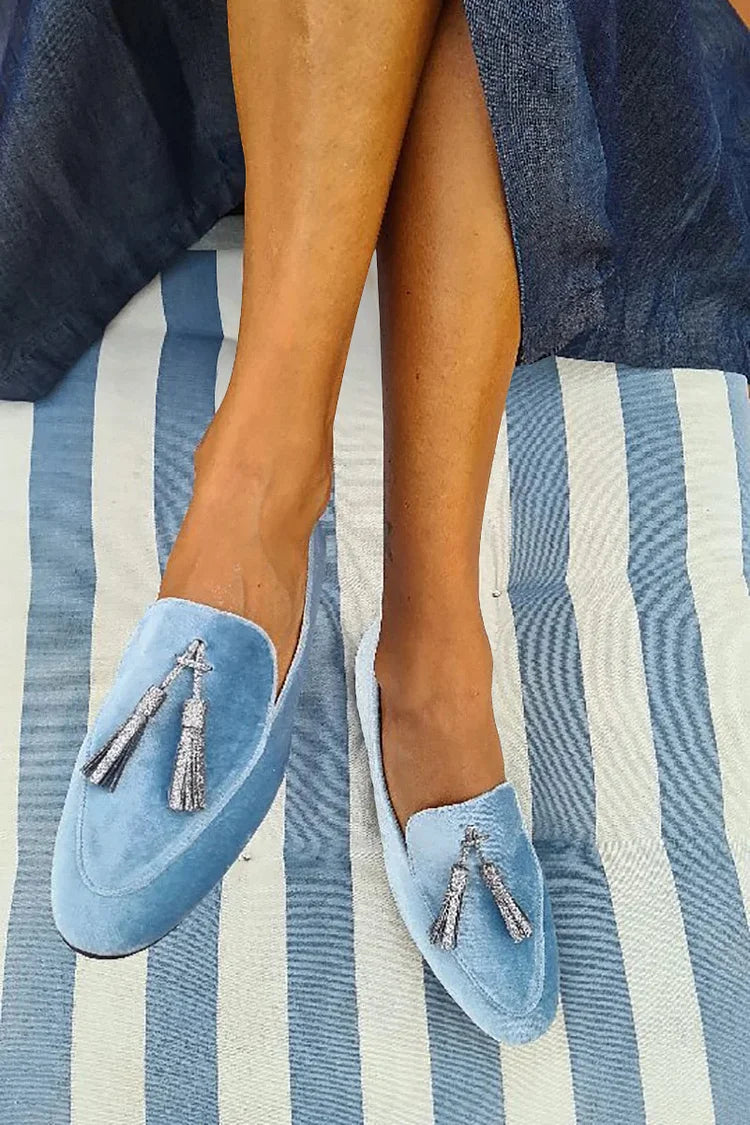 Slipper met zilveren kwastjes